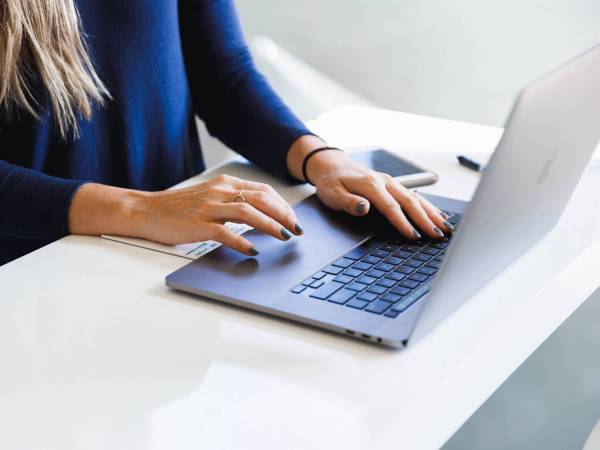 Person working on a laptop computer