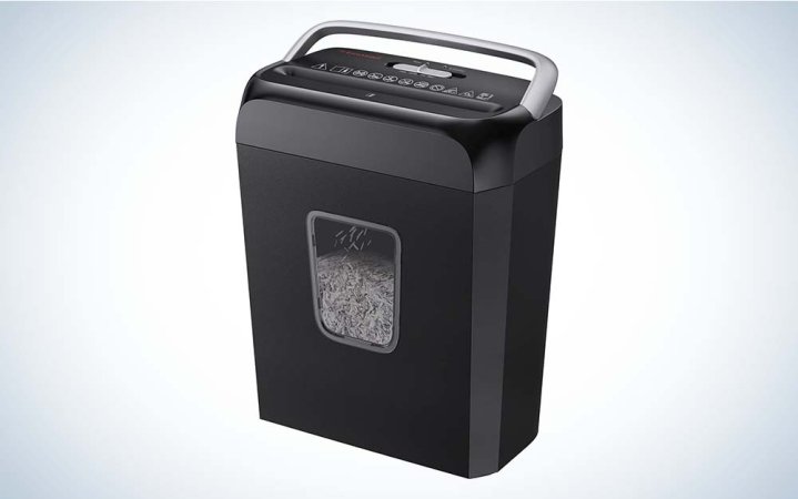  A square black papper shredder made by Bonsaii with a gray handle and small window in front showing shredded paper.