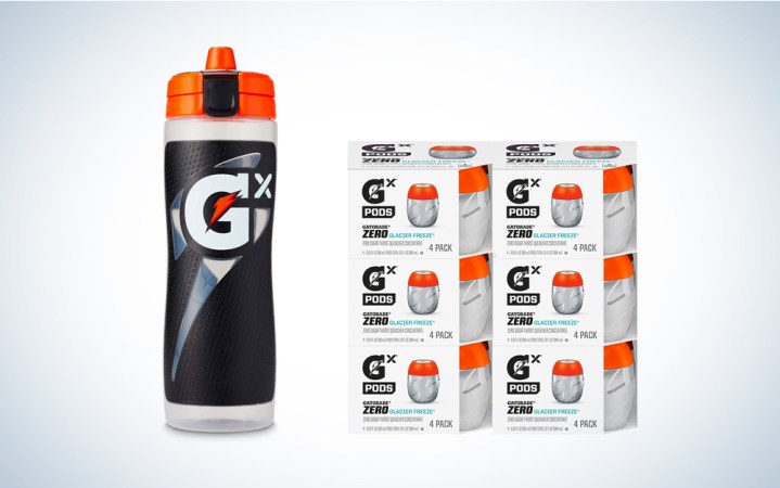  A GX bottle and concentrate pods on a blue and white background