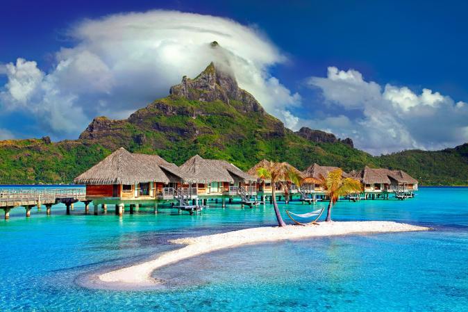 Ocean-front resort with mountain and blue waters