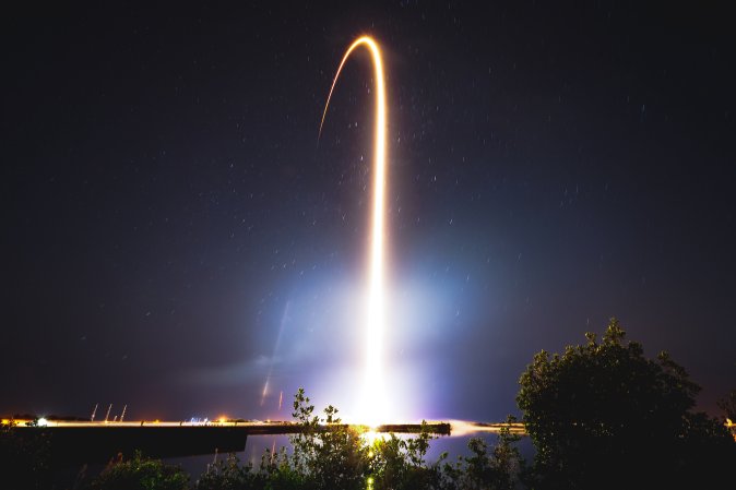 a rocket launching at night