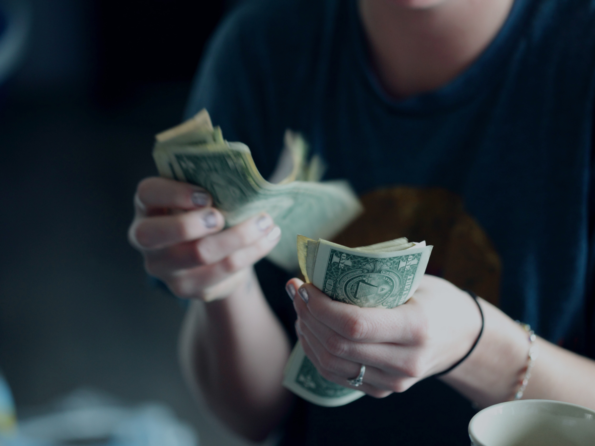 A person counting money.