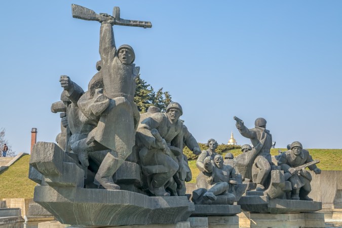 Stone WWII memorial of Soviet soldiers on tanks