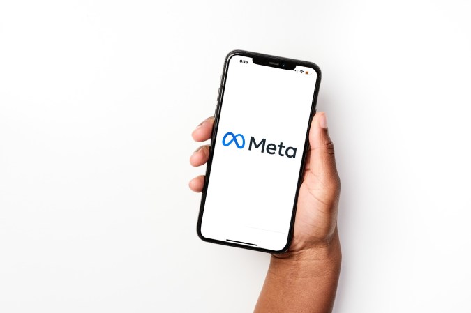 meta logo on iphone screen