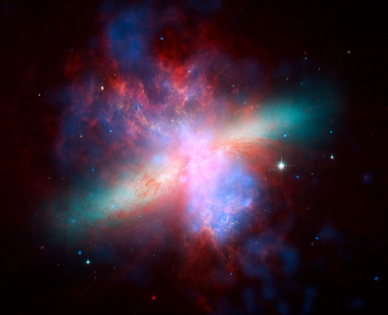 Starburst galaxy in pastel colors in Hubble composite image