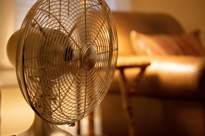 White electric fan in living room.