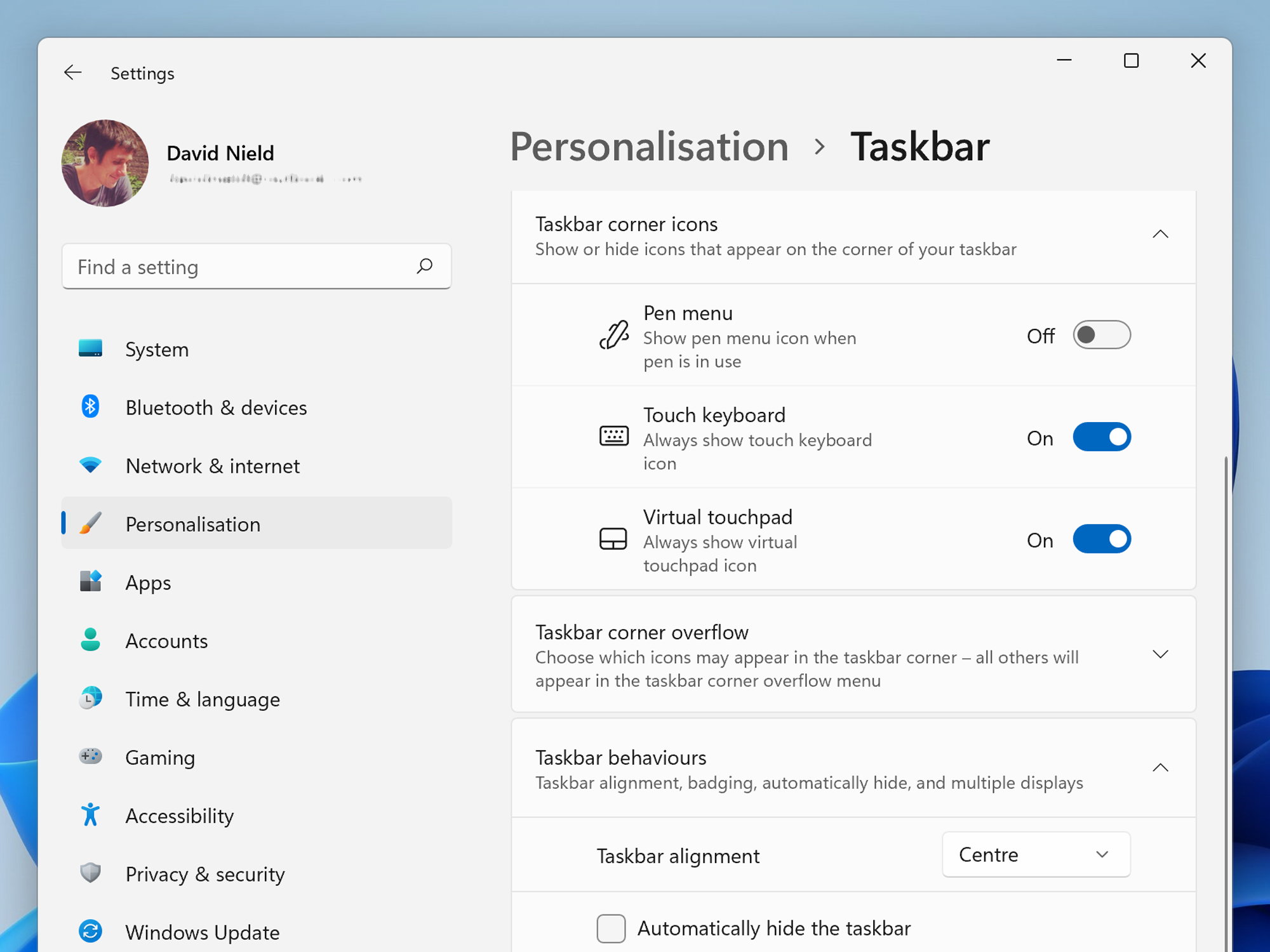 The Windows 11 taskbar customization and personalization settings on a tablet.