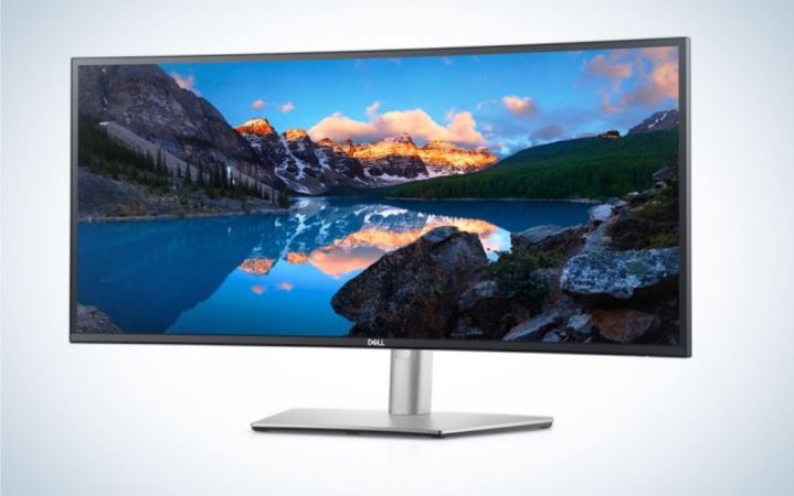  A Dell curved monitor on a plain background.