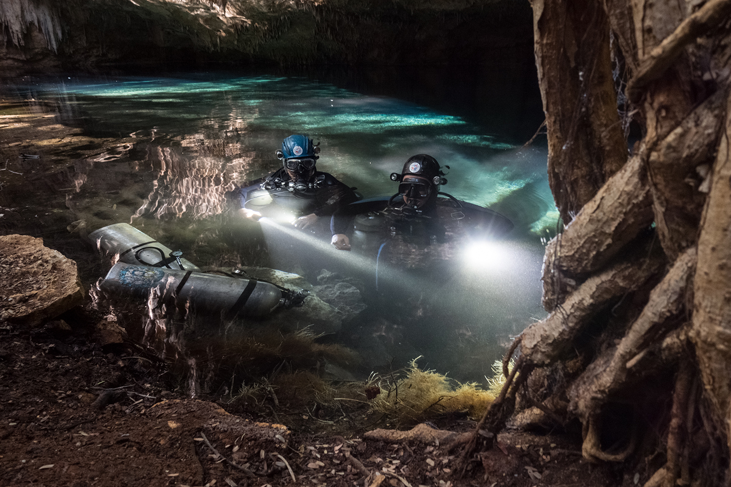 Divers prepare to explore Vintany with extra oxygen tanks