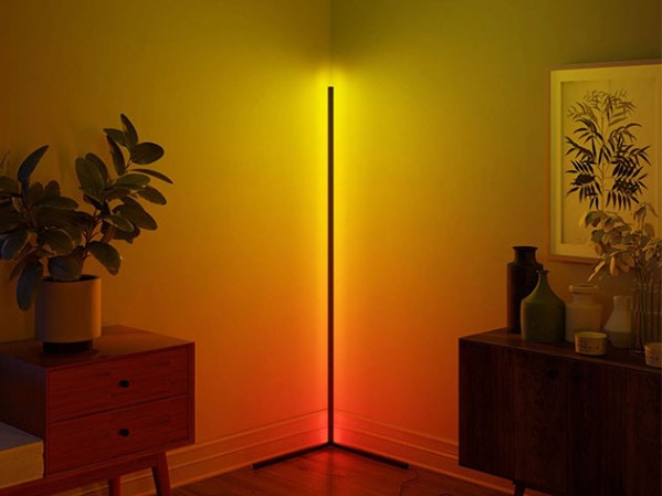 A red, orange, and yellow corner lamp in a living room