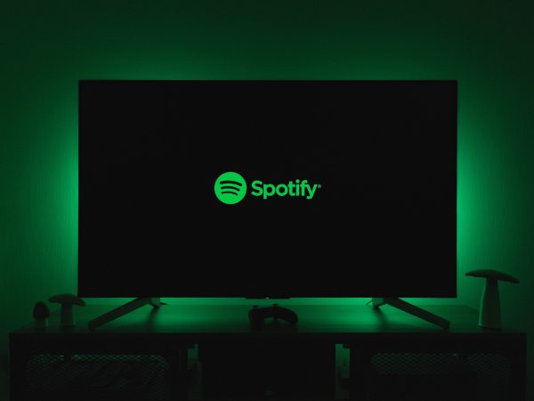 Spotify logo on TV in darkened room