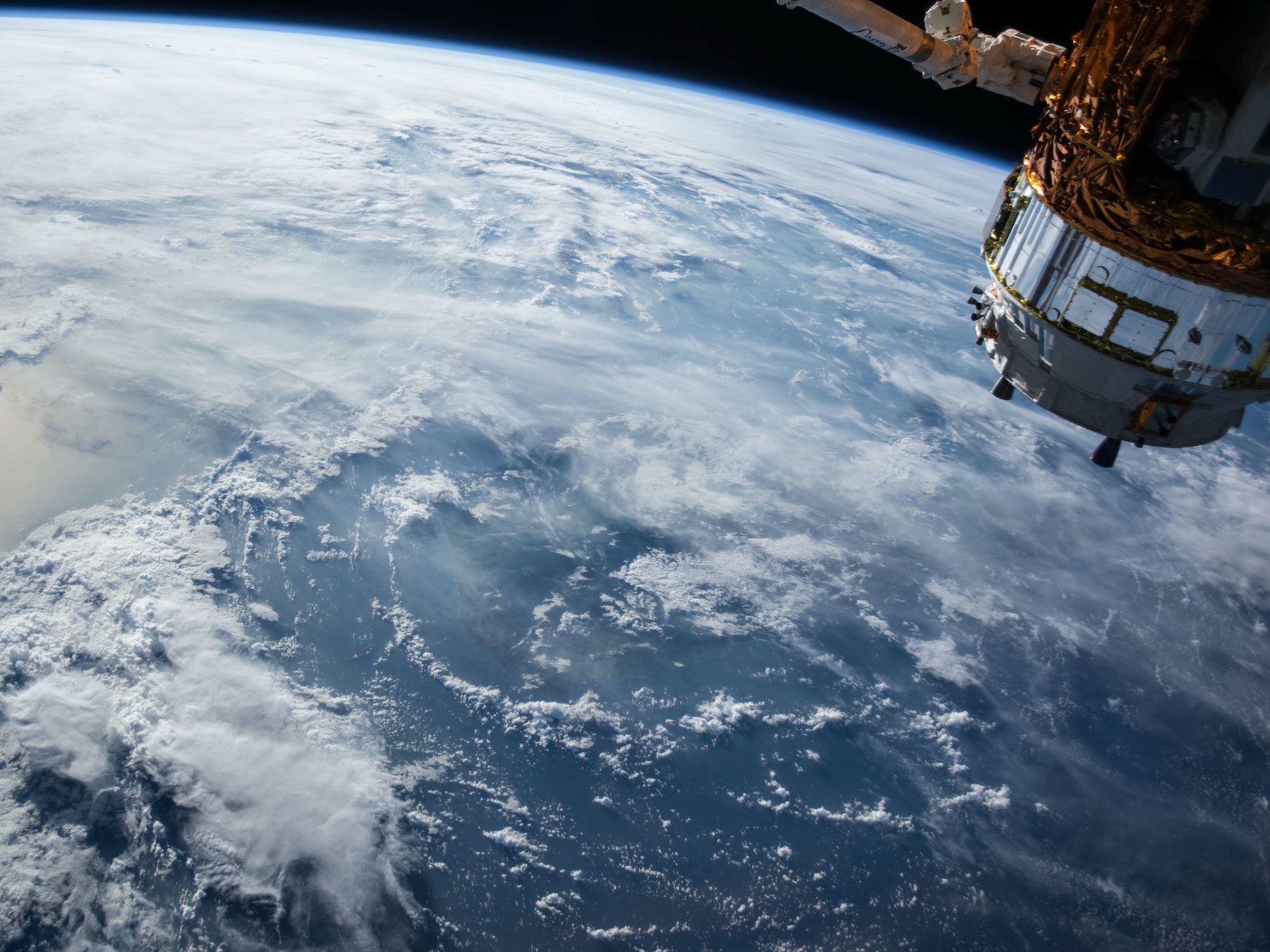 NASA photo of satellite orbiting above Earth