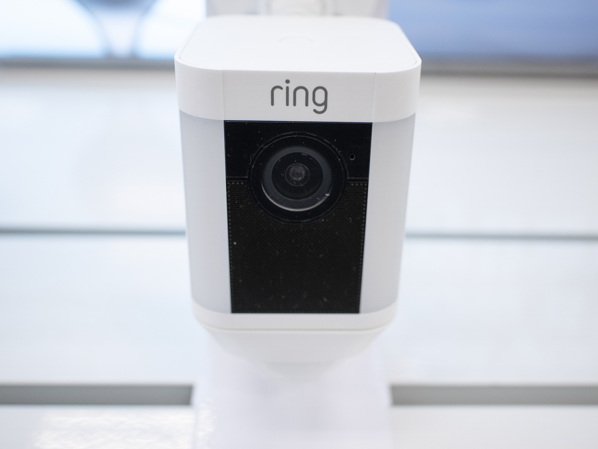 Close up of Amazon Ring security camera mounted outside building