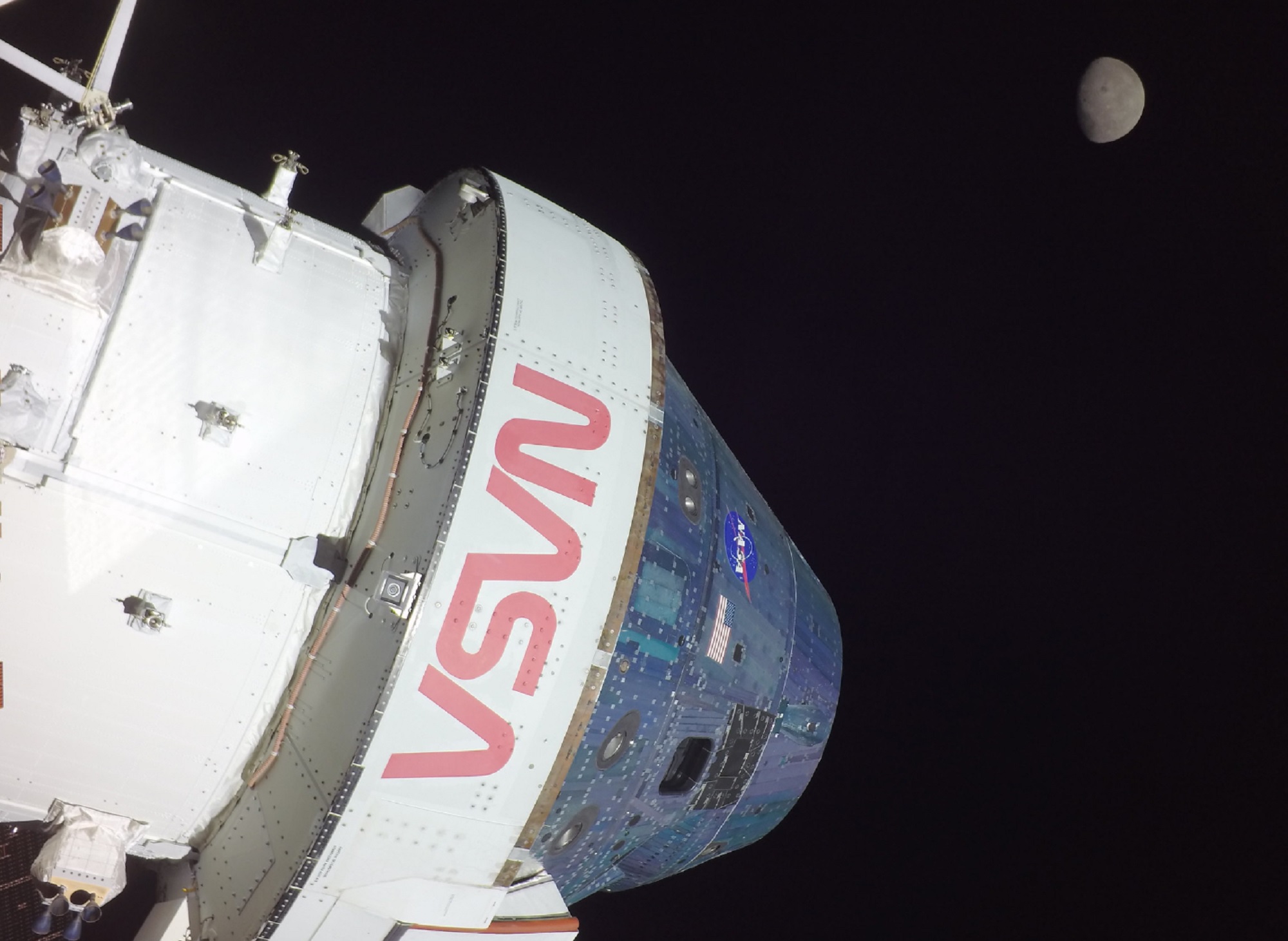 NASA Orion spacecraft with moon in backdrop