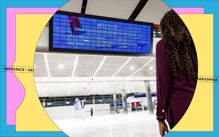  a woman looks at Delta's Parallel Reality screen in Detroit airport