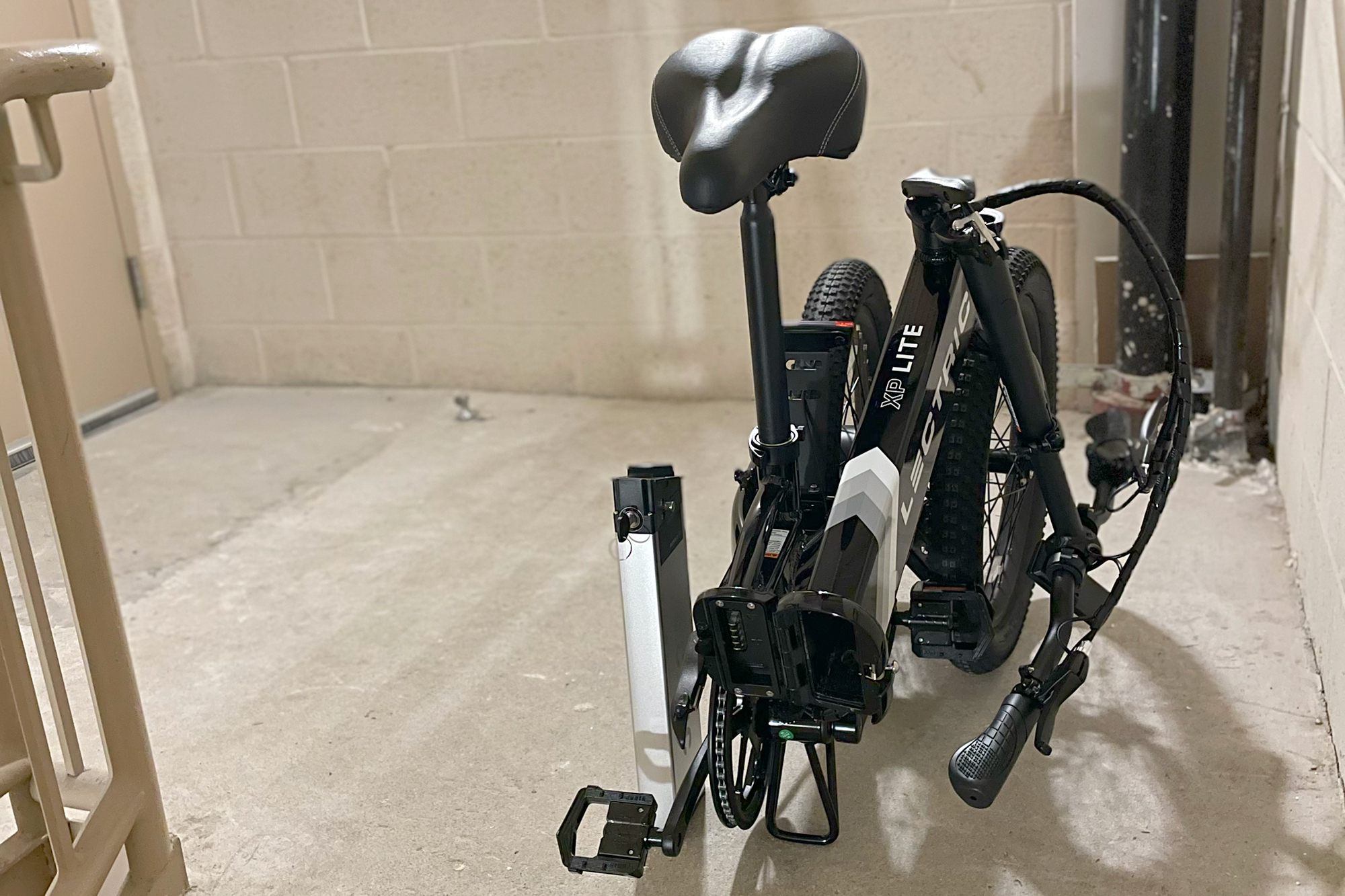 Lectric XP Lite ebike folded in a stairwell