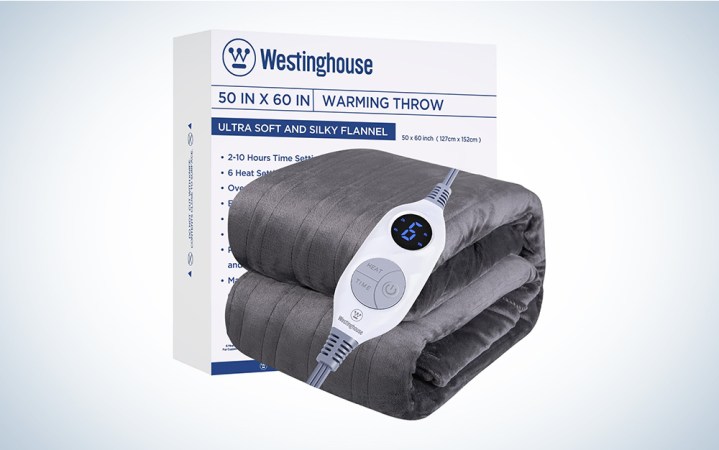  A gray westinghouse heated blanket on a blue and white background