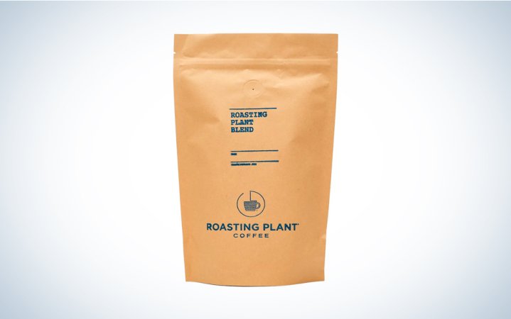  A bag of Roasting Plant coffee on a blue and white background