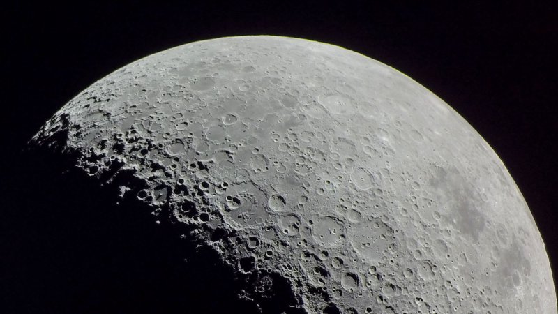 the surface of the moon revealing beautiful craters