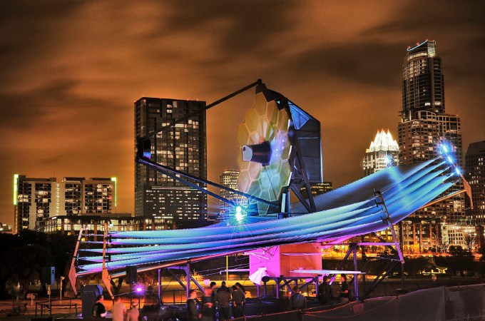 James Webb Space Telescope life-size NASA model in front of Austin skyline