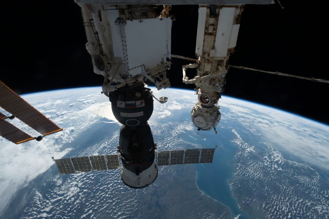 Russian spacecraft Soyuz MS-22 docked on the International Space Station while orbiting Earth