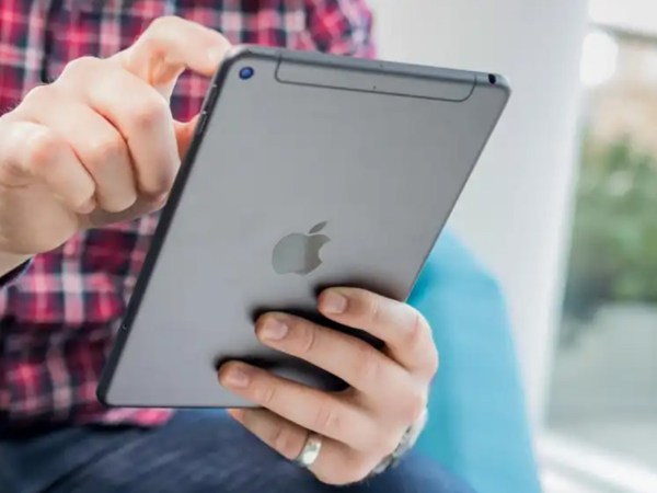 A person uses an iPad mini