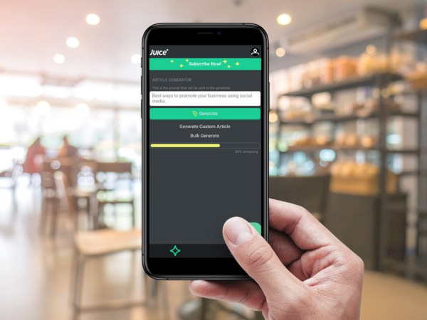 A person holding a phone that has Juice.AI open