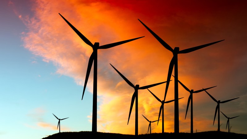 Wind farm silhouette at sunset