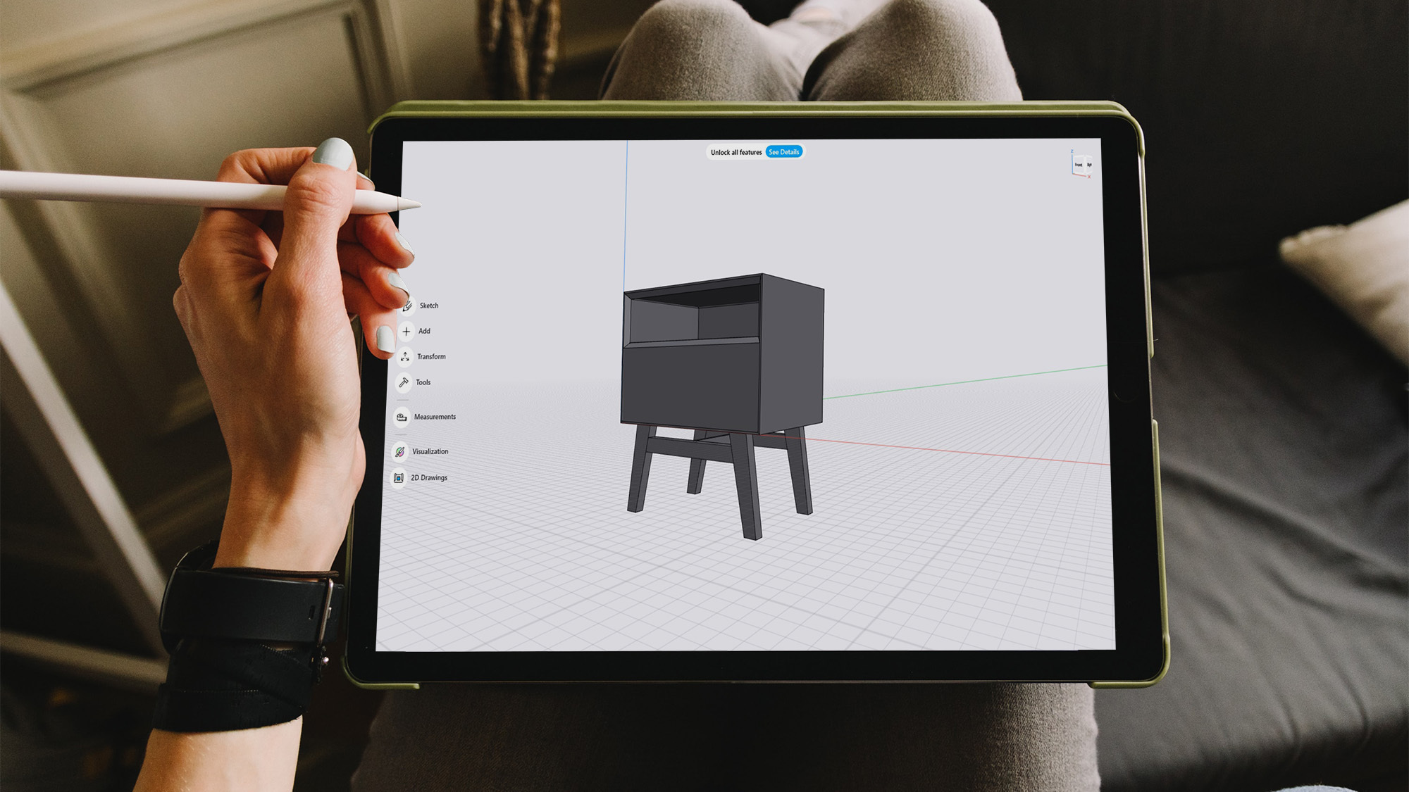 A person using Shapr3D to design a nightstand on an iPad.