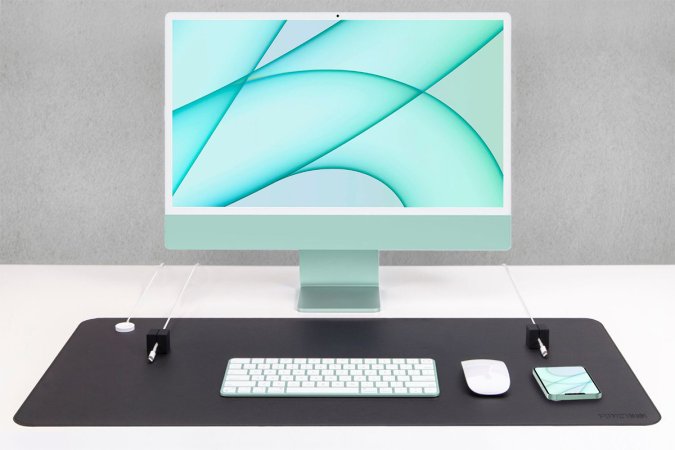 A desktop with a magnetic desk mat