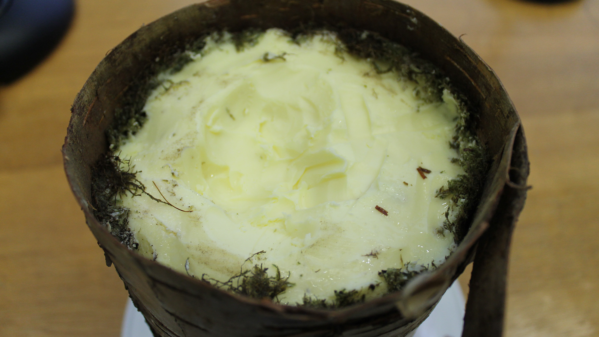 bog butter in a small container