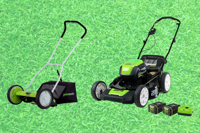 Two Greenworks push lawnmowers on a grass background