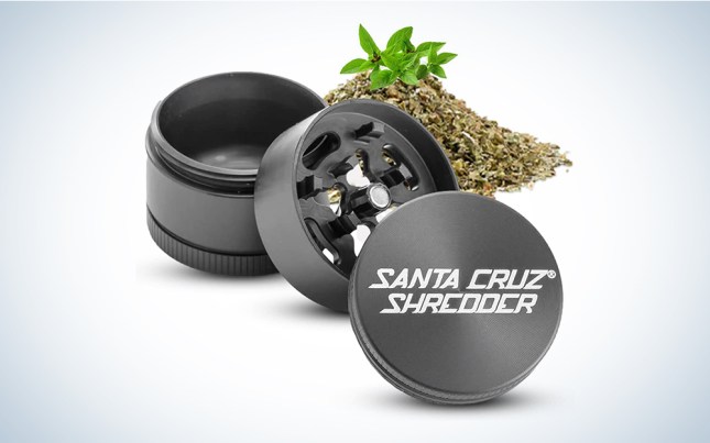 A Santa Cruz Shredder grinder on a blue and white background