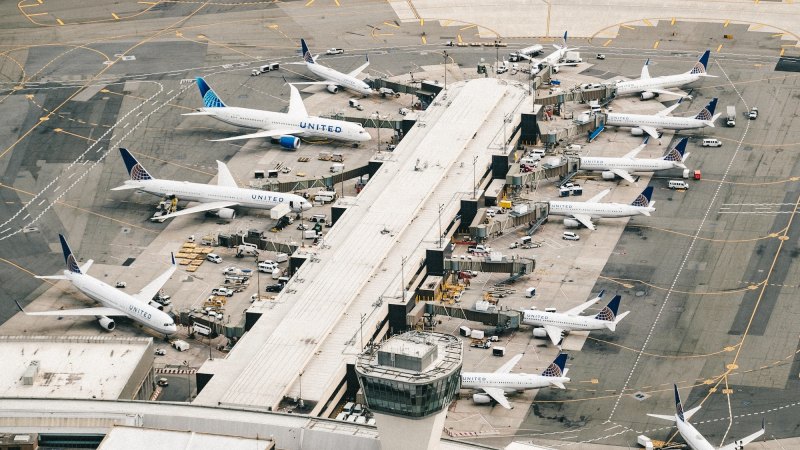 airplanes at different gates in an airport