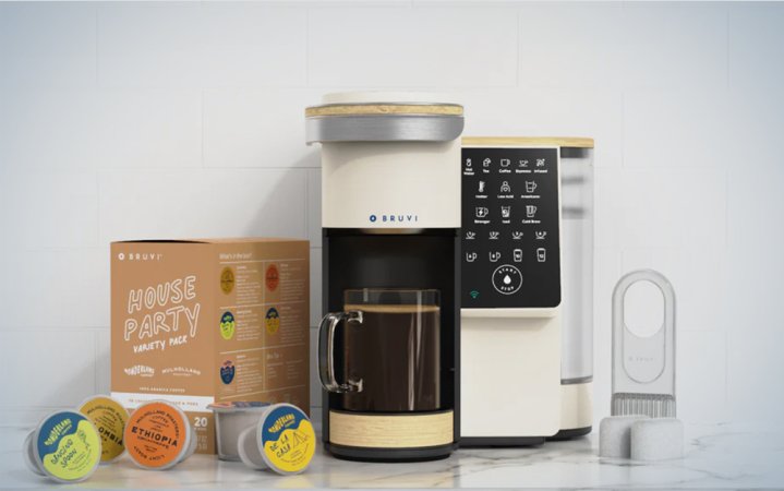  A Bruvi coffee bundle consisting of a machine and B-pods on a kitchen counter