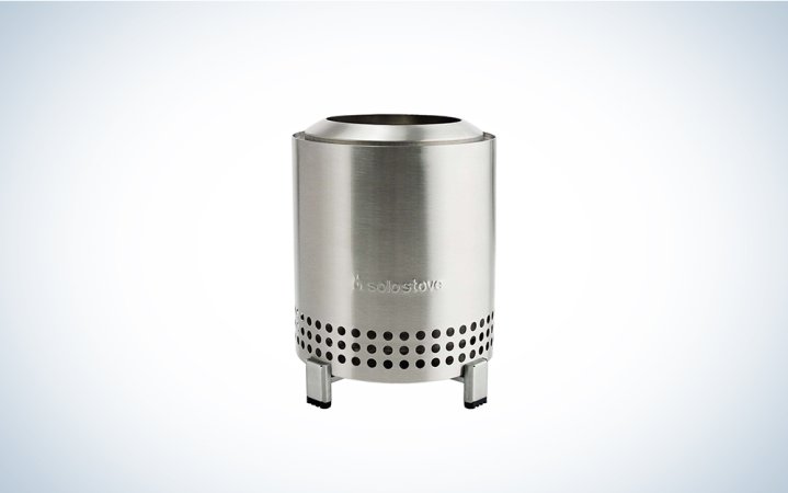  A stainless steel Solo Stove Mesa on a blue and white background