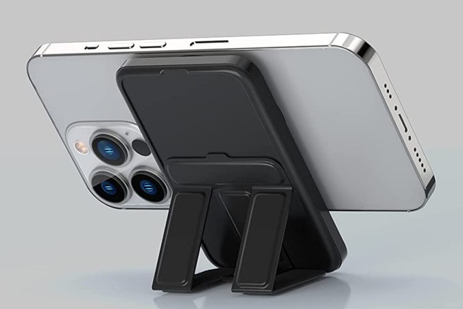 A wireless phone stand on a grey background