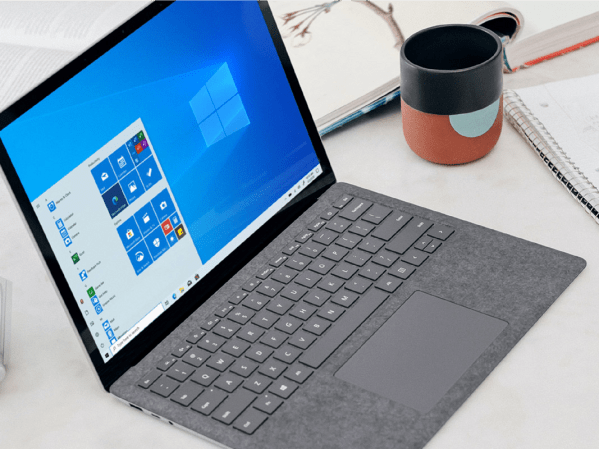 A Microsoft Surface laptop on a desk.