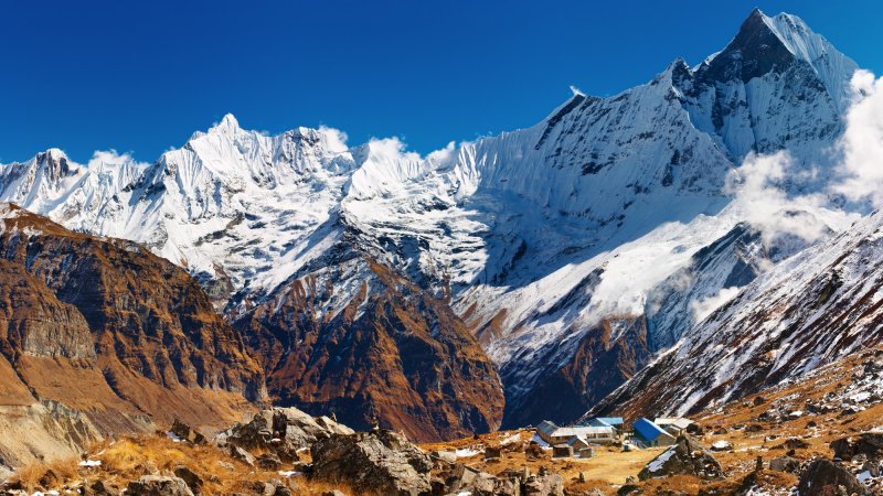 The base camp at Annapurna in the foreground, with the peak behind it.