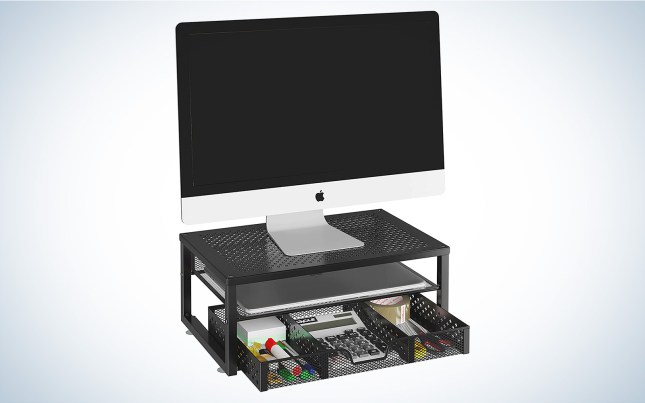 Simple trending monitor stand with supplies underneath