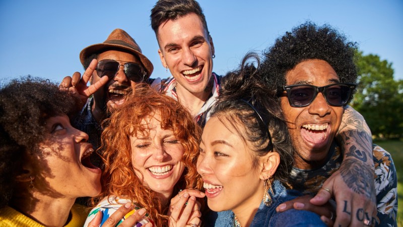 Group of friends laughing.