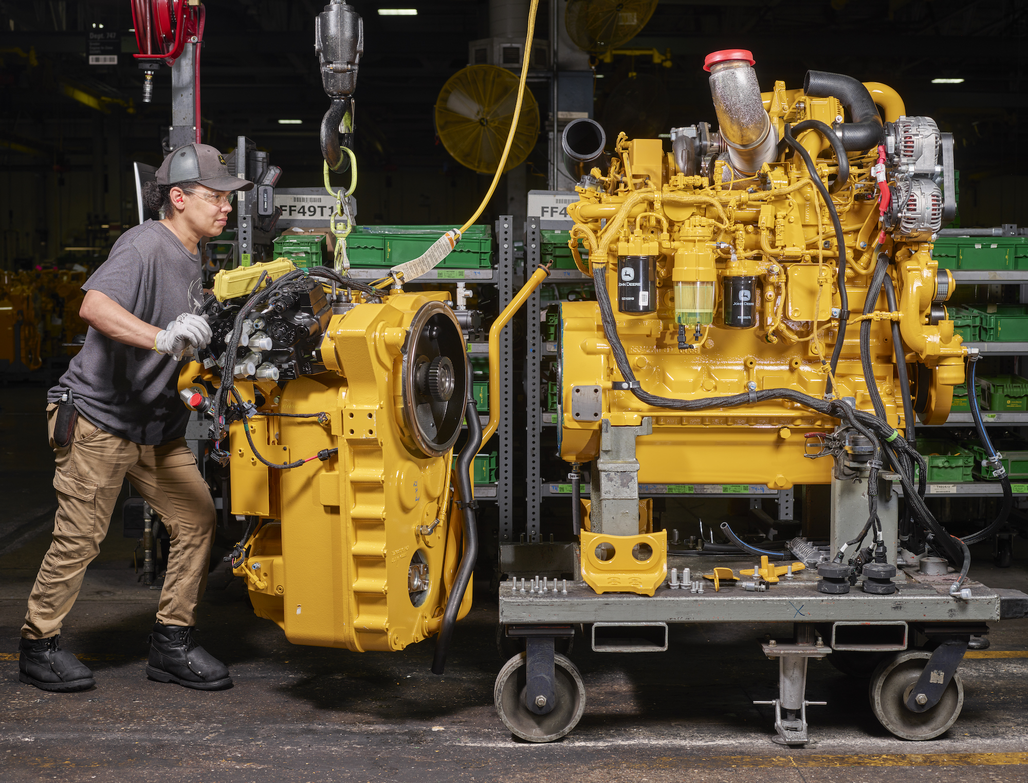 a john deere motor grader engine and transmission in a factory