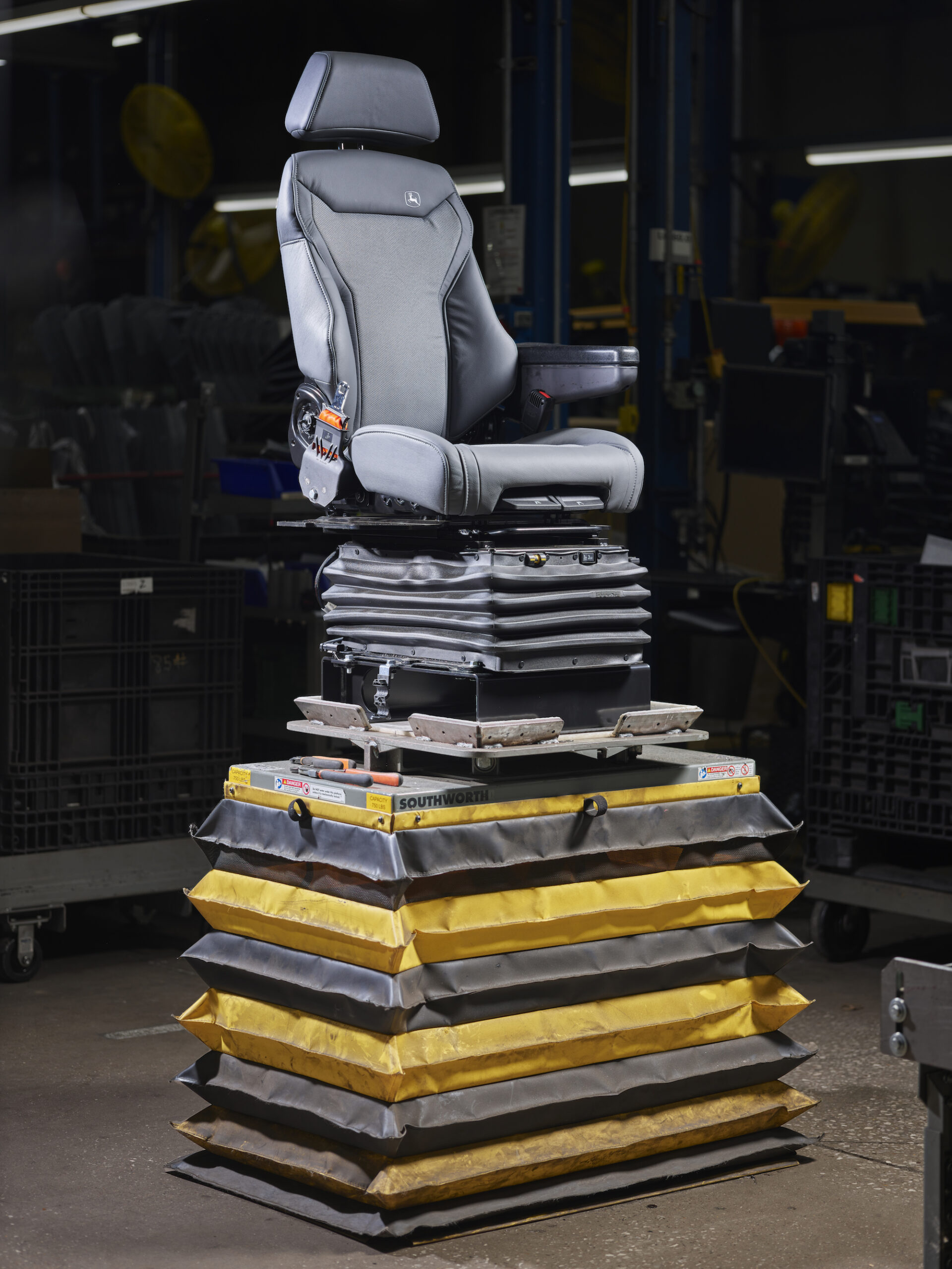 a john deere tractor seat in a factory