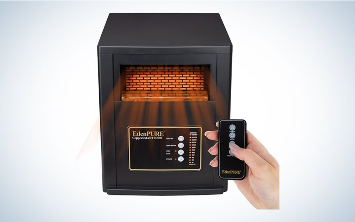  EdenPURE CopperSMART infrared heater for large rooms with a hand holding a remote control