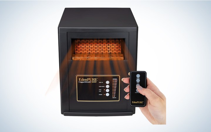  EdenPURE CopperSMART infrared heater for large rooms with a hand holding a remote control