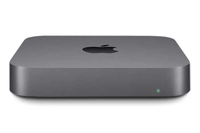 A charcoal Mac Mini on a white background