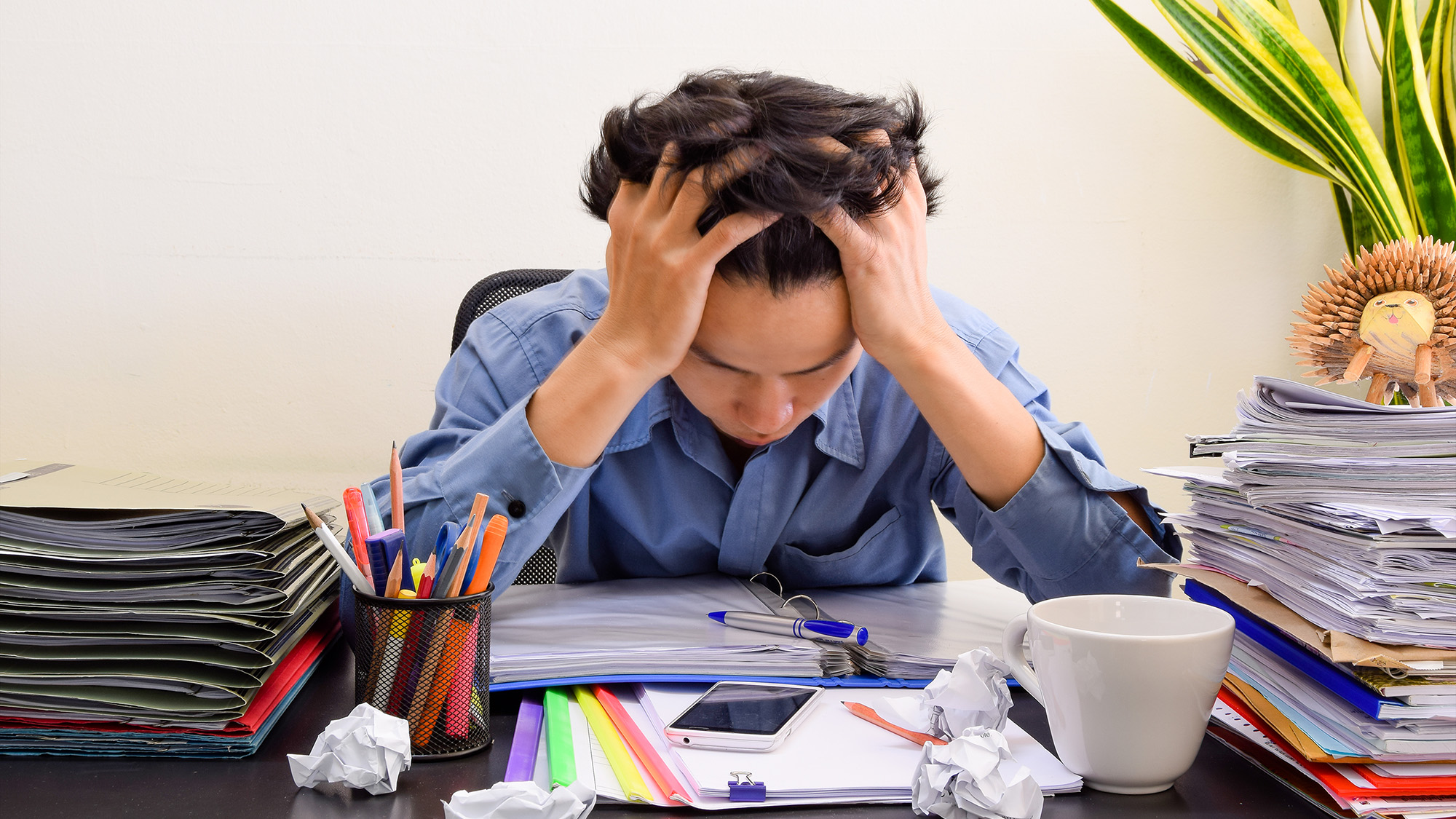 Stressed person probably wondering if they're suffering from burnout