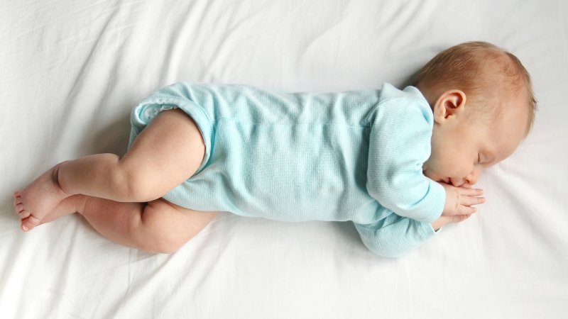 Newborn baby sleeping in crib