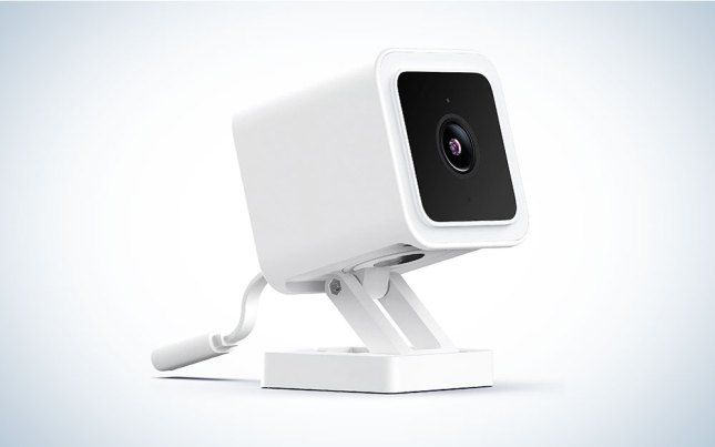 A WYZE camera on a plain background