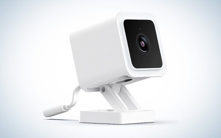  A white WYZE Cam v3 against a white background with a gray gradient.